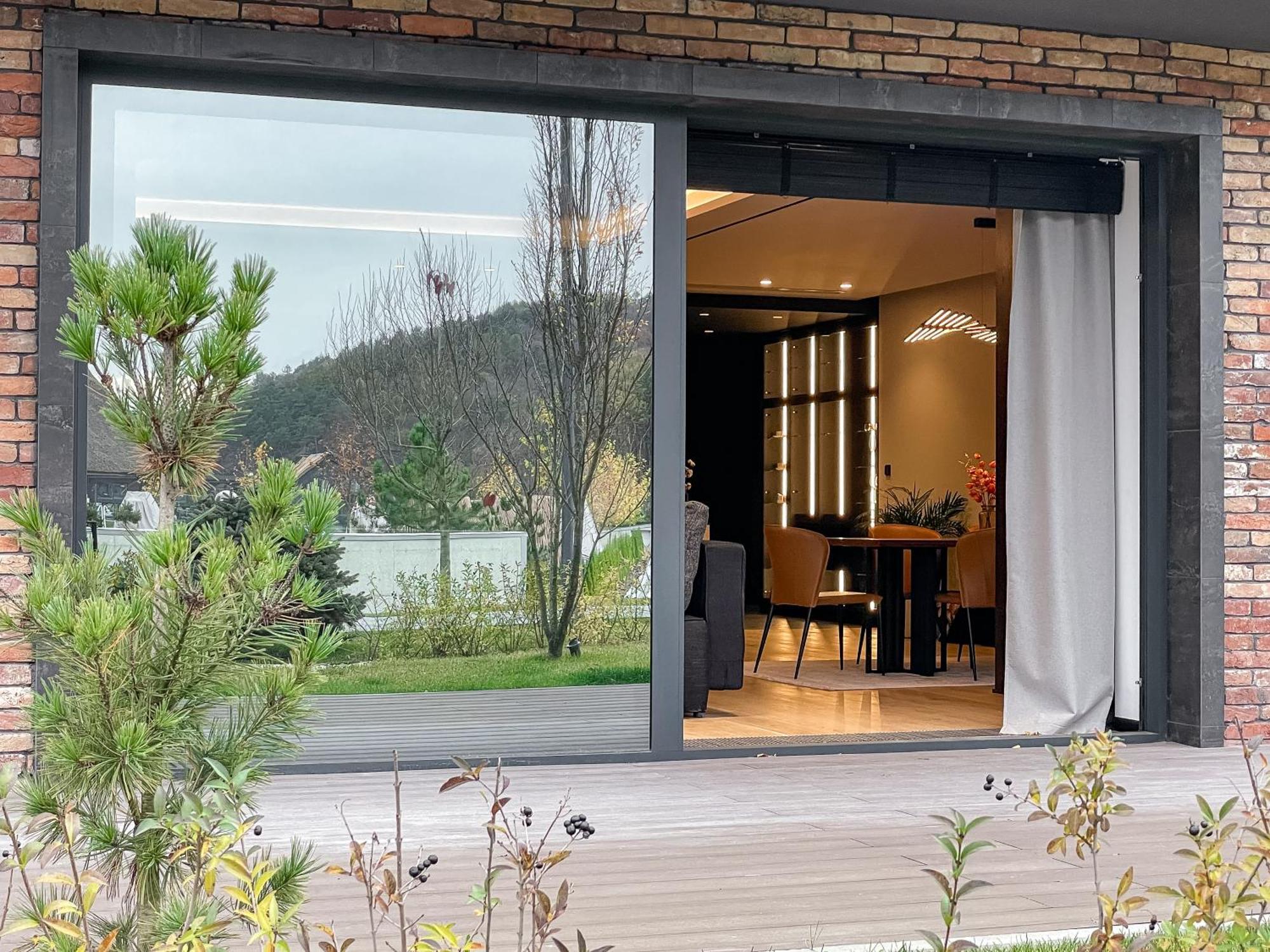 Emily Resort Lviv Bagian luar foto A sliding door