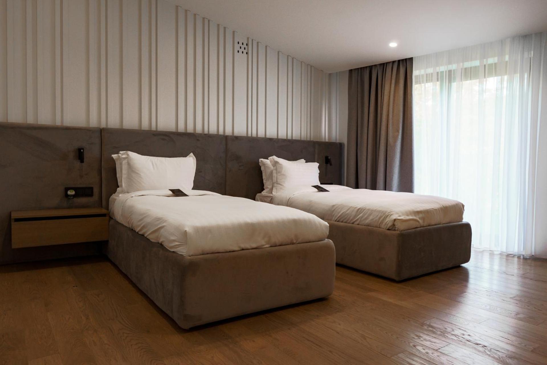 Emily Resort Lviv Bagian luar foto A room at the hotel