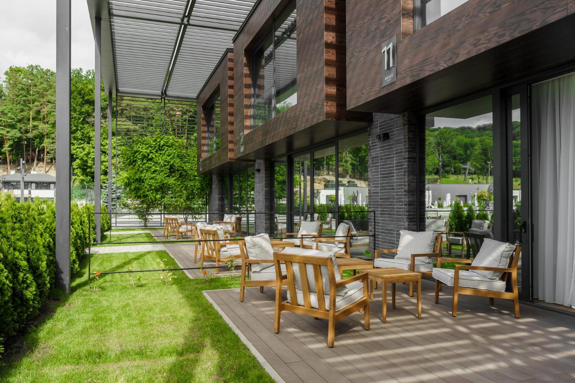 Emily Resort Lviv Bagian luar foto Terrace of the hotel